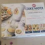 Wilton Cookie Master Plus Cordless Cookie Press Set, 12 Disks, 4 Decorating Tips