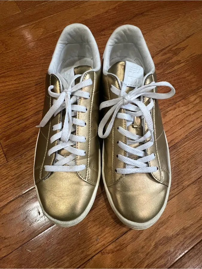New Balance Shoes | New Balance Women's Metallic Gold Low-Top Sneakers With White Laces | Color: Gold/White | Size: 8.5 | Tdclouden's Closet
