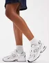New Balance 530 sneakers in white and gray