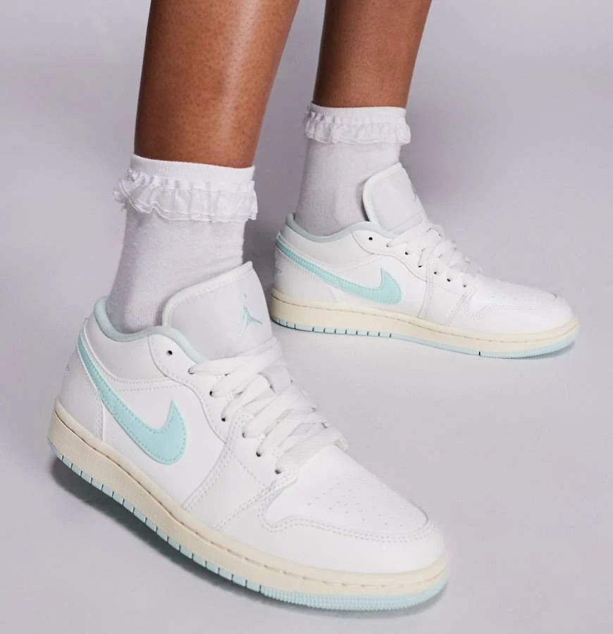 Nike Air Jordan 1 Low sneakers in white and light blue