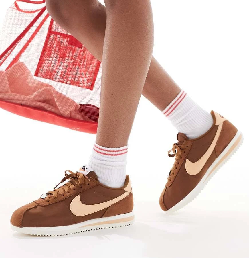 Nike Cortez sneakers in brown & orange