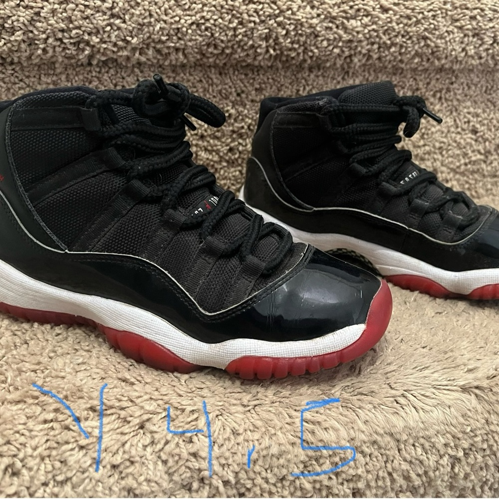 Air Jordan 11 Retro "Bred 2019" Black / White / Varisty-red