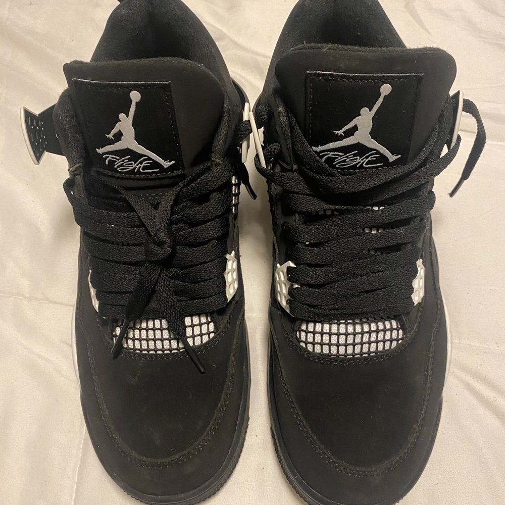 White thunders jordan 4s