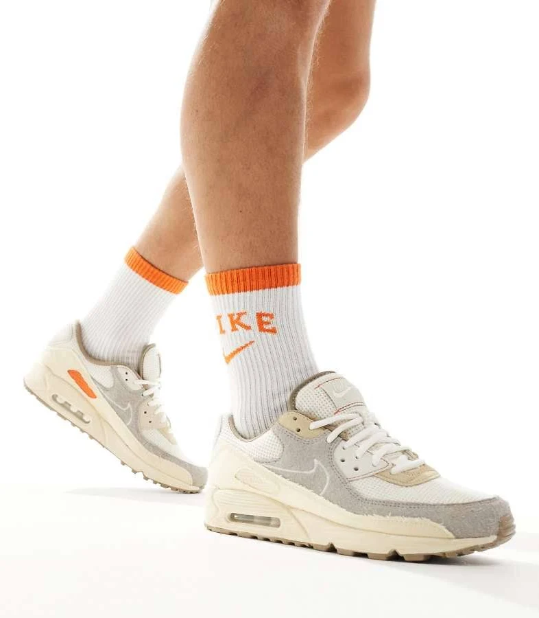 Nike Air Max 90 sneakers in off-white and orange