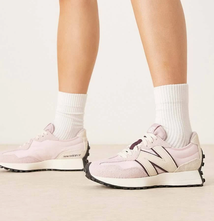 New Balance 327 sneakers in light pink with cream detail
