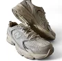 Balance 530 Women’s Authentic Athletic Sneakers In The Color Beige.