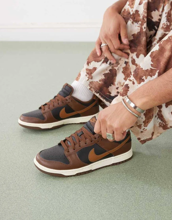 Nike Dunk Low retro sneakers in brown and black