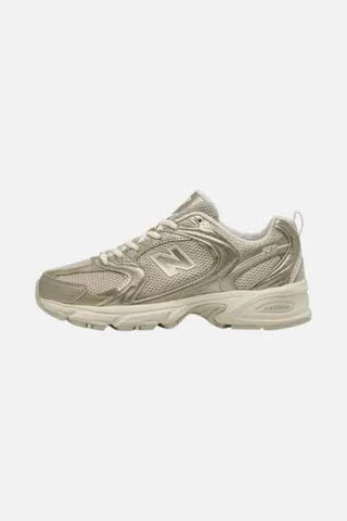 New Balance Women's 530 Sneaker in Gold Metallic Size 9, Sold by Chrome