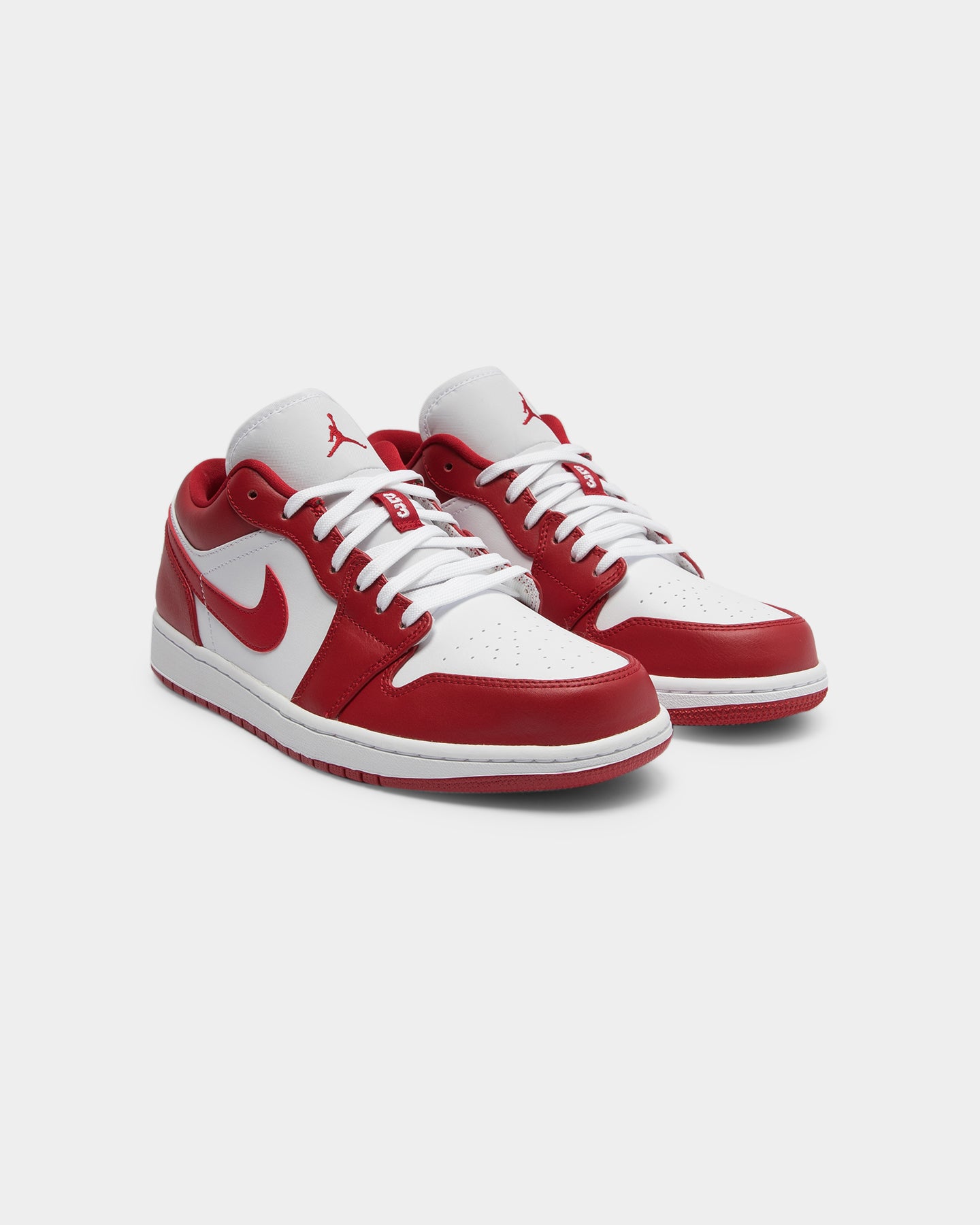 red and white air jordan 1s
