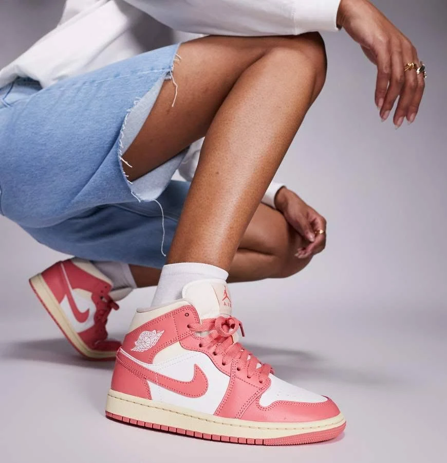 Nike Air Jordan 1 Mid sneakers in pink and white