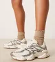 New Balance 9060 sneakers in leopard print - Exclusive to ASOS-Neutral