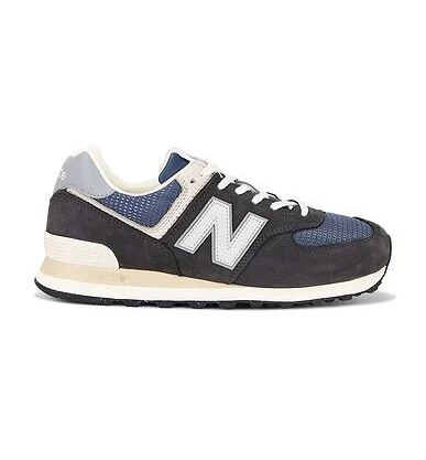 New Balance 574 Sneaker in Black - size Mens 9/Womens 10.5