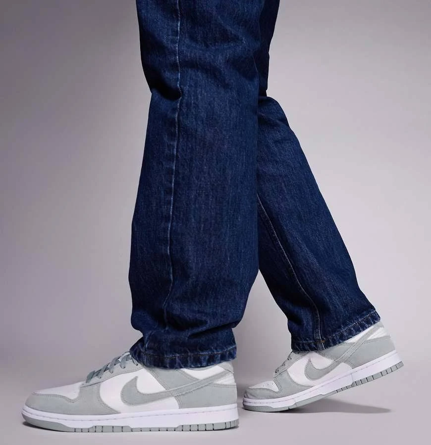 Nike Dunk Low Retro SE sneakers in gray and white