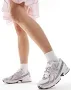 New Balance 740 sneakers in silver and pink