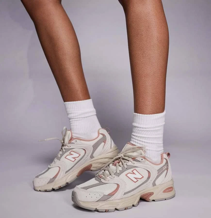 New Balance 530 sneakers in off white and coral