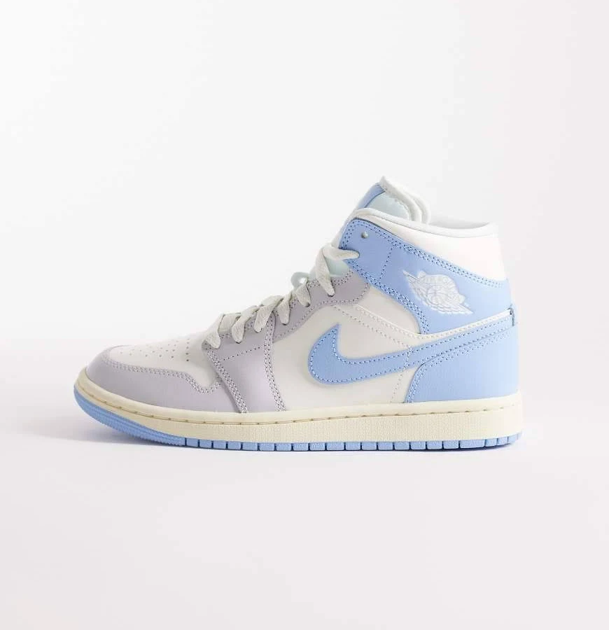 Nike Air Jordan 1 Mid sneakers in light blue and white